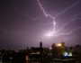 The skyline brightens in a flash of lightening