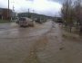 Several people are trapped in their vehicles on one of the main routes through town during the flood